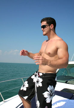 Alain Lamas shows off his body on a yacht